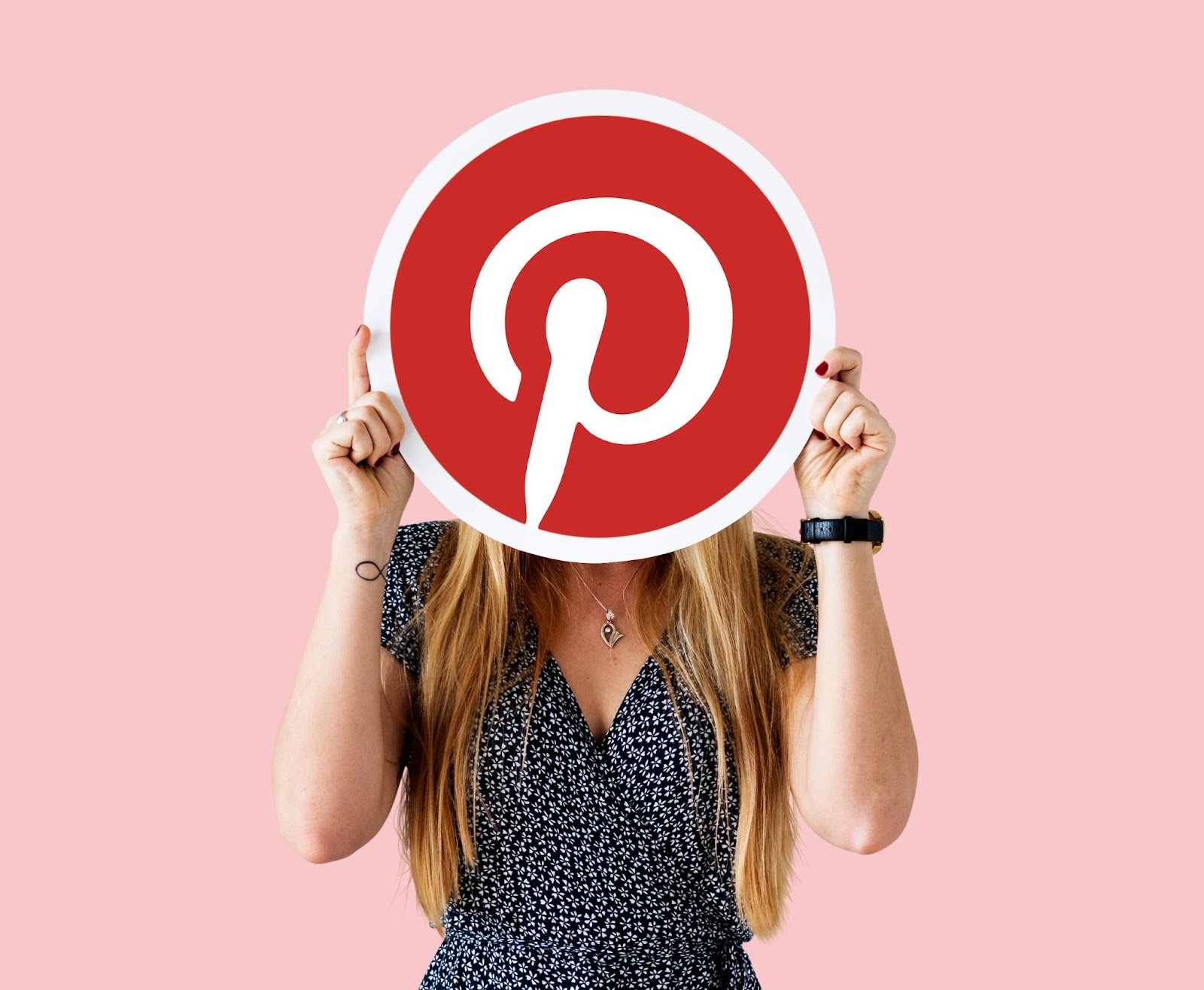woman showing pinterest icon